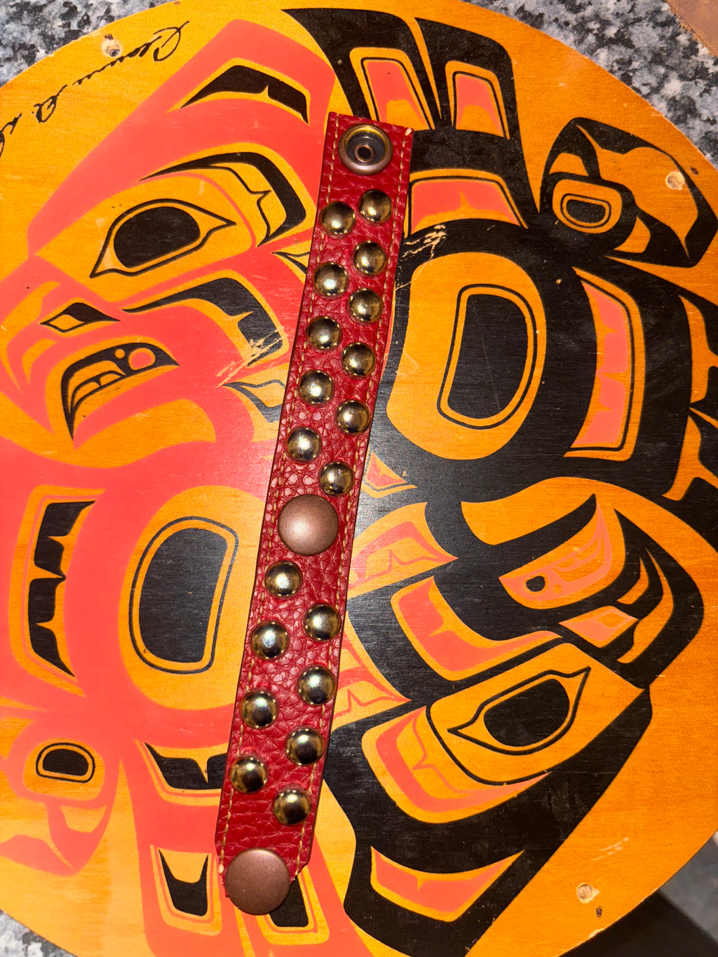 Red hella studs bracelet