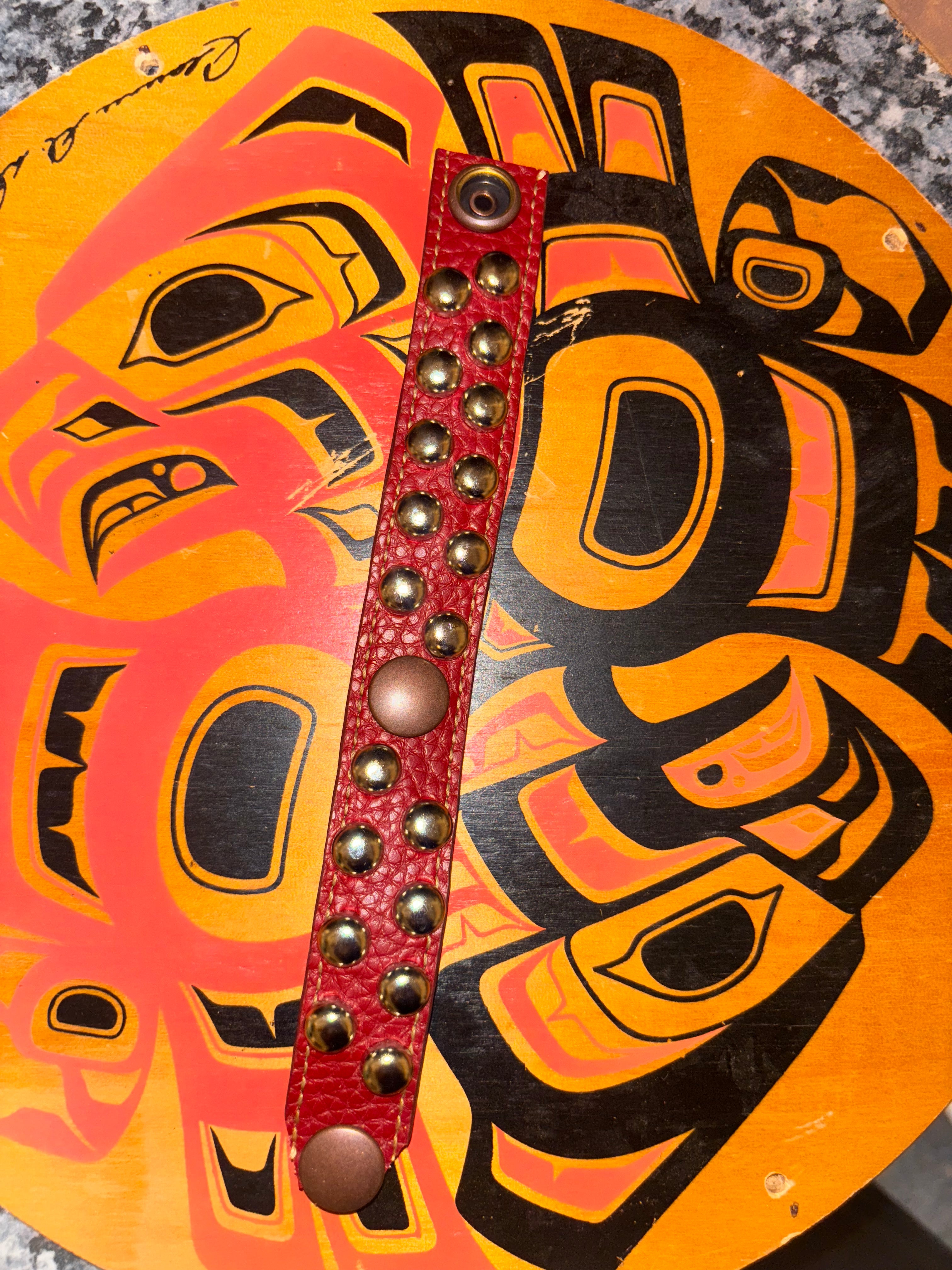 Red hella studs bracelet